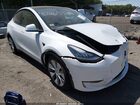 2023 Tesla Model Y Awd/long Range Dual Motor All-wheel Drive White vin: 7SAYGDEE4PF615014