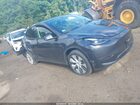 2024 Tesla Model Y Long Range Dual Motor All-wheel Drive Gray vin: 7SAYGDEE4RA274441