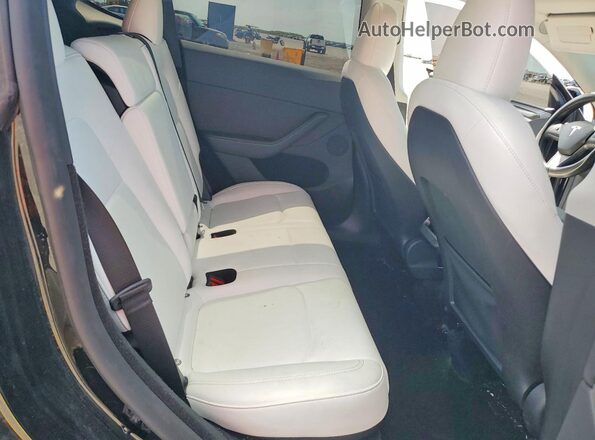 7SAYGDEE4RA294317 2024 TESLA MODEL Черный Вид задних сидений