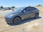 2024 Tesla Model Y Gray vin: 7SAYGDEE7RA220227