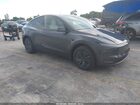 2026 Tesla Model Y All-wheel Drive/long Range Launch Series/premium All-wheel Drive Gray vin: 7SAYGDEE7TA635085