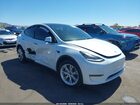 2022 Tesla Model Y Long Range Dual Motor All-wheel Drive White vin: 7SAYGDEE8NF449299