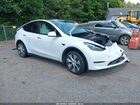 2023 Tesla Model Y Awd/long Range Dual Motor All-wheel Drive White vin: 7SAYGDEE8PF697202