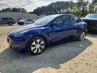 2024 Tesla Model Y Blue vin: 7SAYGDEE8RA227249