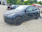 2025 Tesla Model Y Black vin: 7SAYGDEE8SF297696