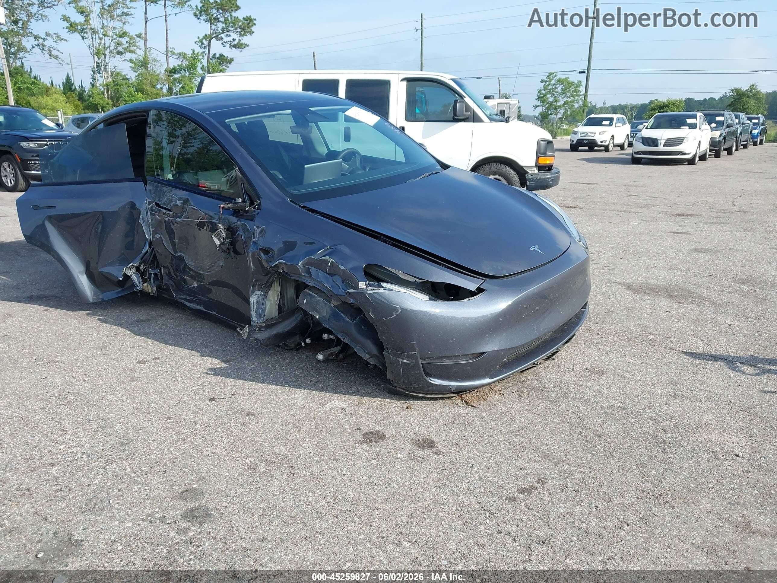 7SAYGDEE9PA032855 — 2023 TESLA MODEL Y History & VIN | AutoHelperBot
