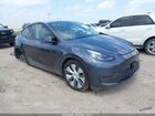 2023 Tesla Model Y Awd/long Range Dual Motor All-wheel Drive Gray vin: 7SAYGDEE9PA162733