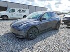 2024 Tesla Model Y Gray vin: 7SAYGDEE9RA321303