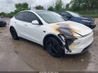 2026 Tesla Model Y All-wheel Drive/long Range Launch Series/premium All-wheel Drive White vin: 7SAYGDEE9TF408600