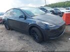 2024 Tesla Model Y Long Range Dual Motor All-wheel Drive Gray vin: 7SAYGDEEXRA231528