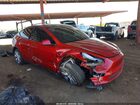 2024 Tesla Model Y Long Range Dual Motor All-wheel Drive Red vin: 7SAYGDEEXRA238317