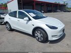 2024 Tesla Model Y Long Range Dual Motor All-wheel Drive White vin: 7SAYGDEEXRA253965