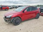 2024 Tesla Model Y Red vin: 7SAYGDEF0RA302650