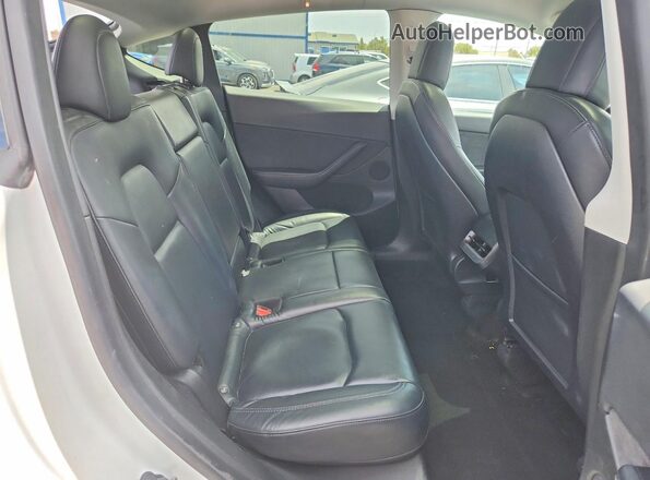 7SAYGDEF1NF456541 2022 TESLA MODEL White Vista de los asientos traseros