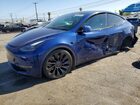 2022 Tesla Model Y Blue vin: 7SAYGDEF3NF489461