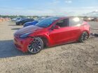 2024 Tesla Model Y Red vin: 7SAYGDEF7RA313080