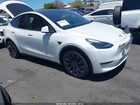 2024 Tesla Model Y Performance Dual Motor All-wheel Drive White vin: 7SAYGDEF9RF126958