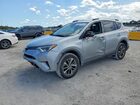 2018 Toyota Rav4 Hybrid Le Silver vin: JTMRJREV5JD213856