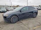 2026 Tesla Model Y Black vin: 7SAYGDED1TA608388