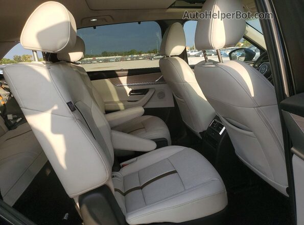 JM3KKEHA3R1179808 2024 MAZDA CX-90 Blue Rear interior view