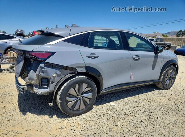 JN1BF0BA9RM432589 2024 NISSAN ARIYA Silver Trasero derecho