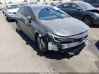 2024 Toyota Corolla Hybrid Le Gray vin: JTDBCMFE1R3036866