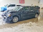 2025 Toyota Corolla Hybrid Le Black vin: JTDBCMFE4S3072136