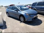 2026 Toyota Corolla Hybrid Hybrid Le Light Blue vin: JTDBCMFE4T3133678