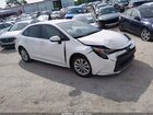 2024 Toyota Corolla Hybrid Le White vin: JTDBCMFE5R3050544