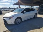 2024 Toyota Corolla Hybrid Le White vin: JTDBCMFE6R3047104