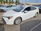 2025 Toyota Corolla Hybrid Le White vin: JTDBCMFE8S3086606