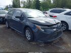 2025 Toyota Corolla Hybrid Le Gray vin: JTDBCMFE9S3075825