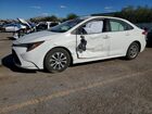 2022 Toyota Corolla Hybrid Le White vin: JTDEAMDE2N3014097