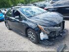 2021 Toyota Corolla Hybrid Le Black vin: JTDEAMDE3MJ034661