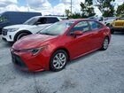 2020 Toyota Corolla Le Красный vin: JTDEPRAEXLJ033389