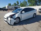 2021 Toyota Prius Le White vin: JTDKAMFU3M3150177