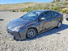 2021 Toyota Prius Le Charcoal vin: JTDKAMFU7M3130465