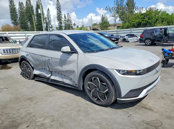KM8KN4AE0NU072209 2022 HYUNDAI IONIQ Gray Front right