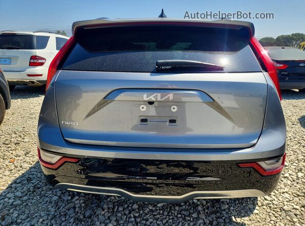KNDCT3L15P5069192 2023 KIA NIRO Серый Вид сзади