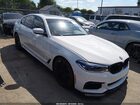 WBAJE7C52KWW17306