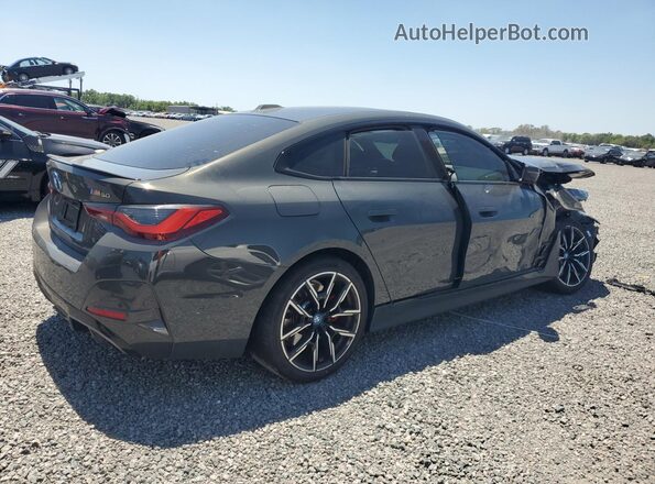 WBY33AW07PFR16357 2023 BMW I4 Gray Rear right