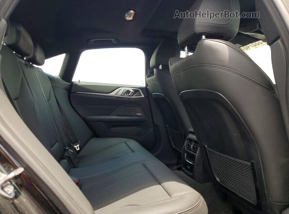 WBY43AW03RFS43977 2024 BMW I4 Black Rear seats view