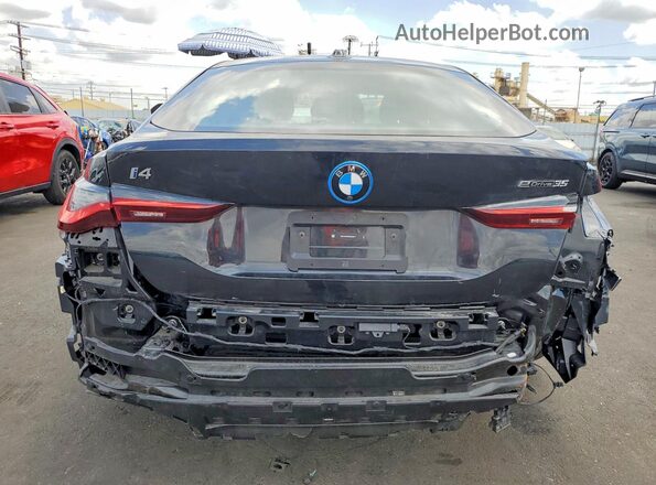 WBY43AW03RFS43977 2024 BMW I4 Black Rear view