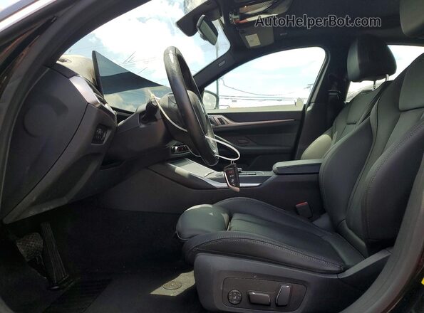 WBY43AW03RFS43977 2024 BMW I4 Black Front interior view