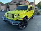 2022 Jeep Wrangler Unlimited Sahara 4xe Yellow vin: 1C4JJXP63NW275287