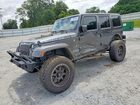 2016 Jeep Wrangler Unlimited Rubicon Gray vin: 1C4BJWFG8GL299548