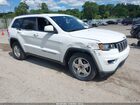 2018 Jeep Grand Cherokee Laredo E 4x4 White vin: 1C4RJFAG9JC267012