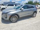 2024 Cadillac Xt4 Luxury Blue vin: 1GYAZAR45RF103361