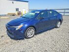 2025 Toyota Corolla Hybrid Le Blue vin: JTDBDMHE3S3016604