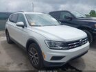 2020 Volkswagen Tiguan 2.0t Se/2.0t Se R-line Black/2.0t Sel White vin: 3VV3B7AX1LM016061